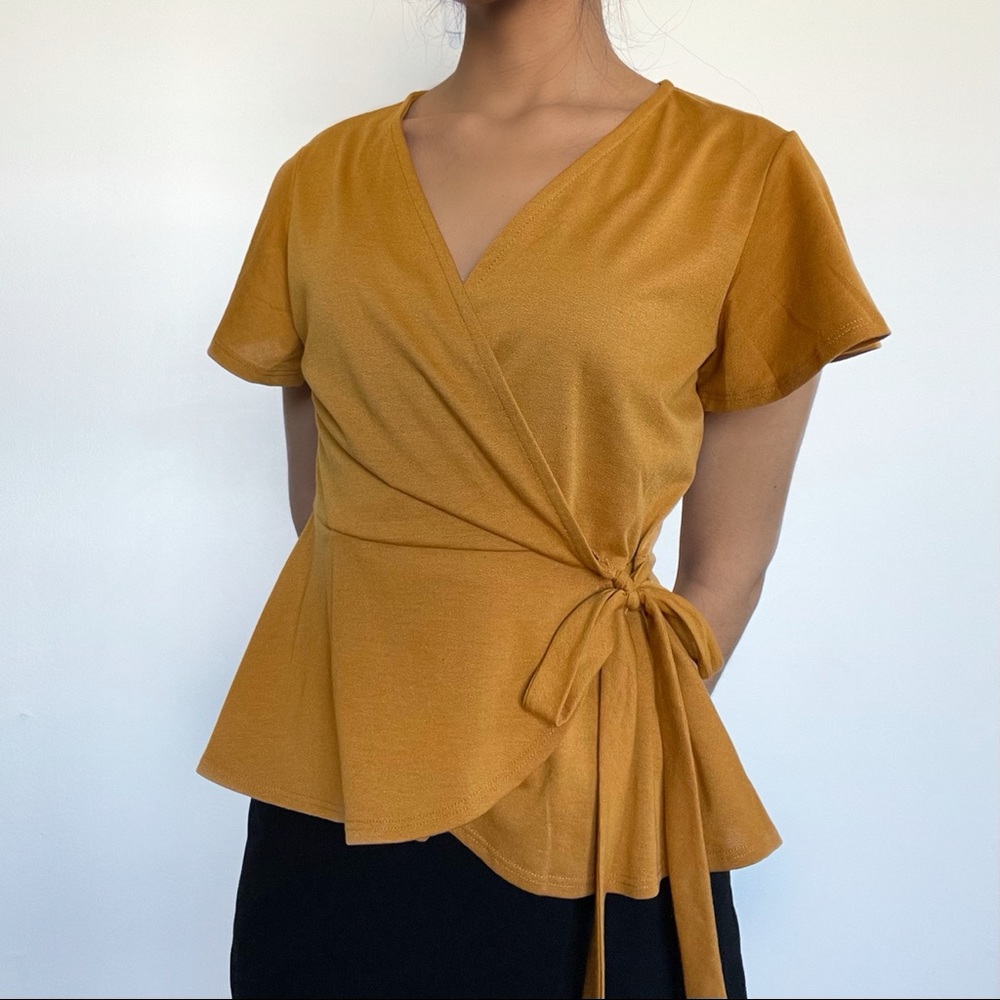 Tie cross over peplum top